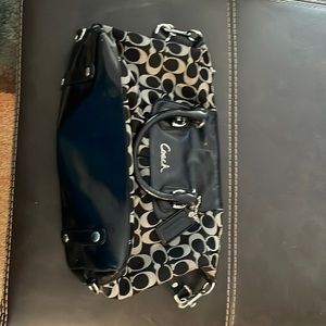 Gray and black coach bag